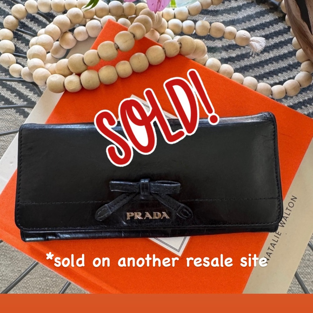 PRADA Continental Bifold Wallet Bow Detail Black Leather. Excellent condition.